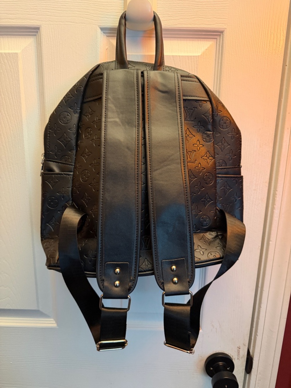 Embossed Monogram Black Backpack - Picture 2 of 11